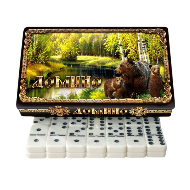 detail DOMINO v kovovém balení Medvěd v lesu