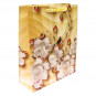 náhled Dárková taška zlatá s bílé květiny 26x33x11cm